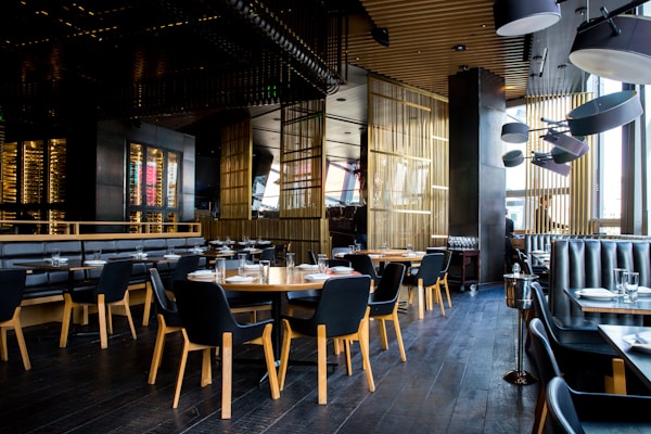 Warm restaurant interior with wooden tables