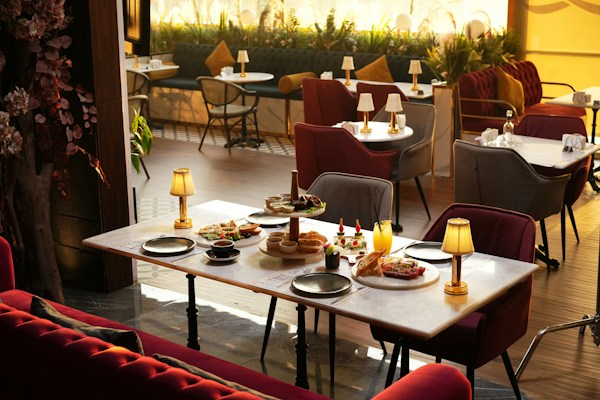 Dining table with food and warm lighting